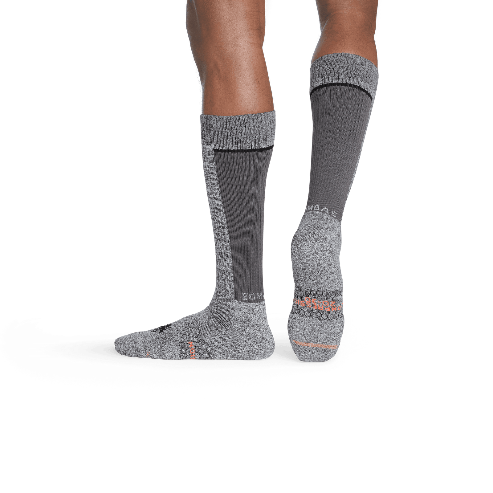 official-bombas::7673-charcoal-neonorange-adult-male-3-transparent.png