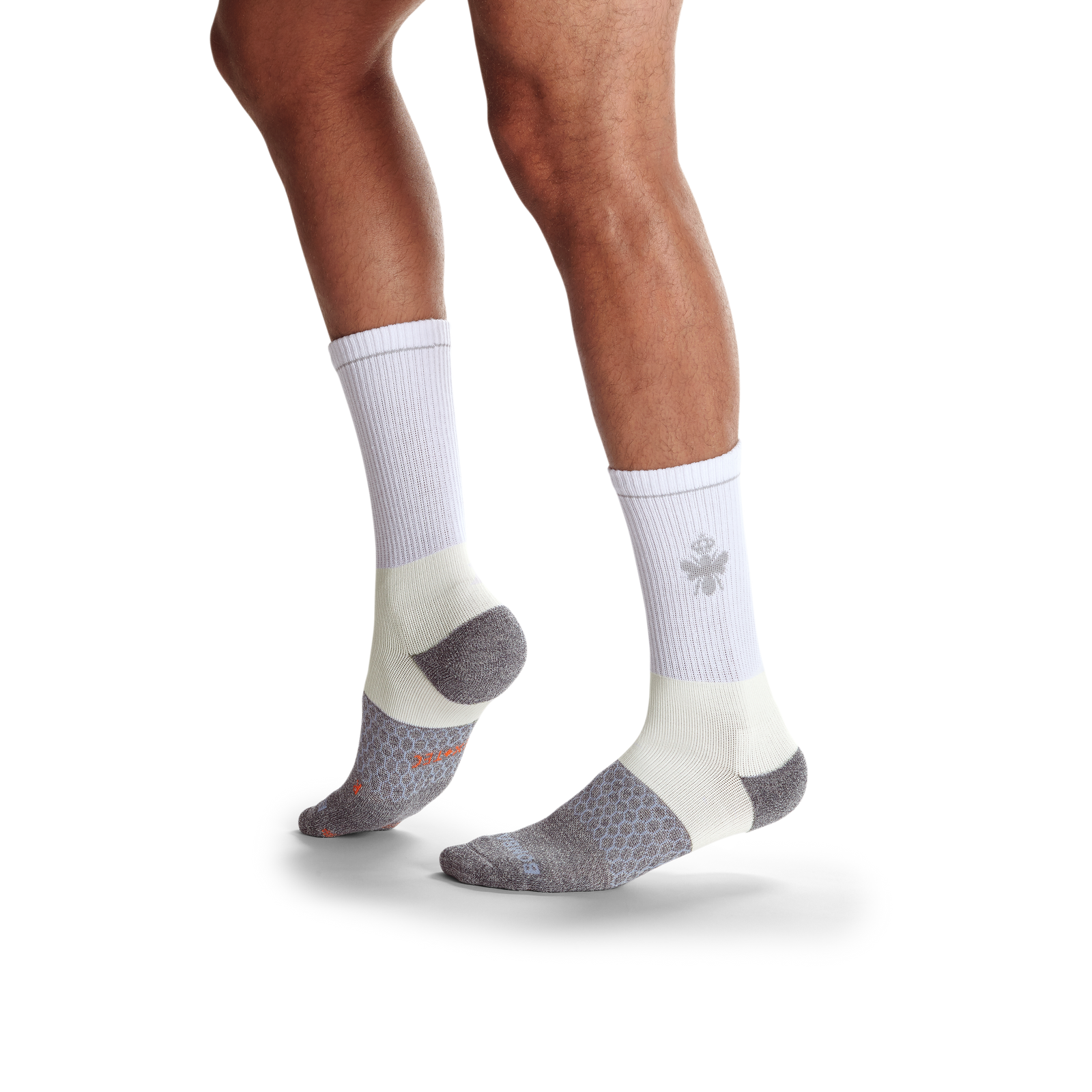 official-bombas::white-onmodel-2-transparent_ad5b5624-ca98-44f4-b3e5-23fc3c74c4b0.png